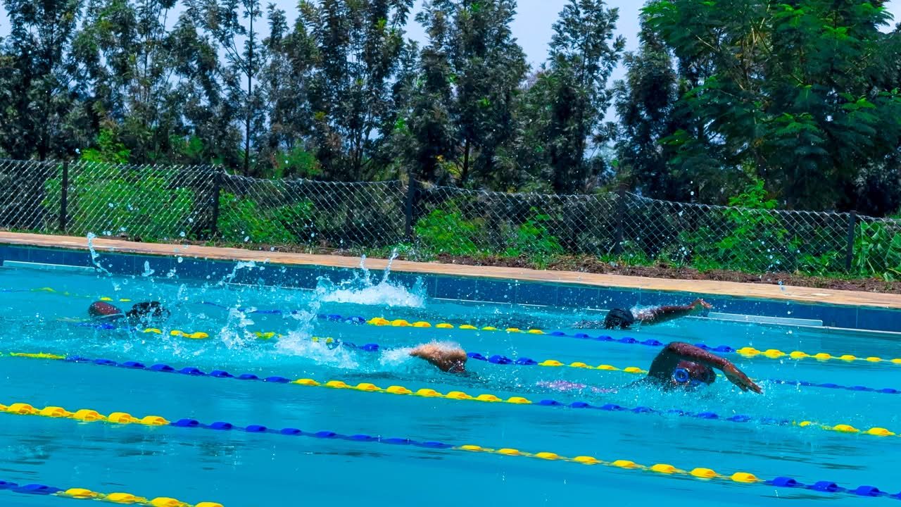 A swimmer powers down the lane during a heat
